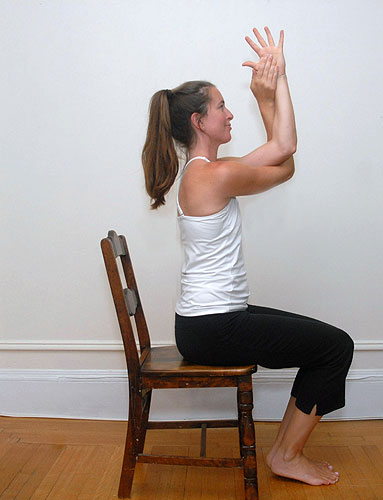 4 Yoga Poses You Can Do At Your Desk | The Centre